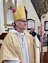 Photograph of Bishop Jonathan Presiding at Benefice Eucharist on 28th April 2024